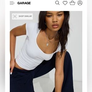 NWOT cropped white garage baby t shirt